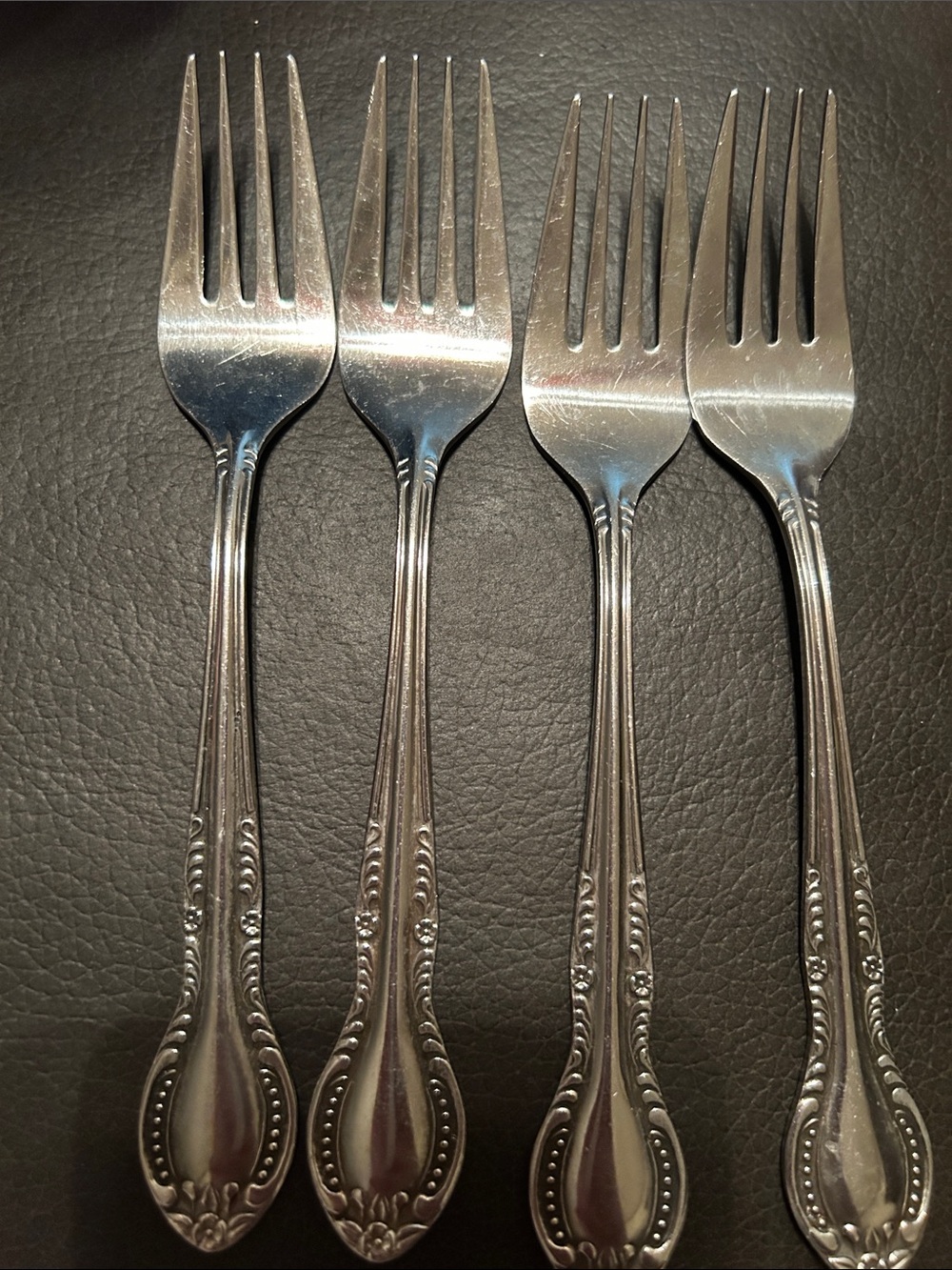 Columbia Polished Silver Decorative Handle Dinner Forks - Set of 4
